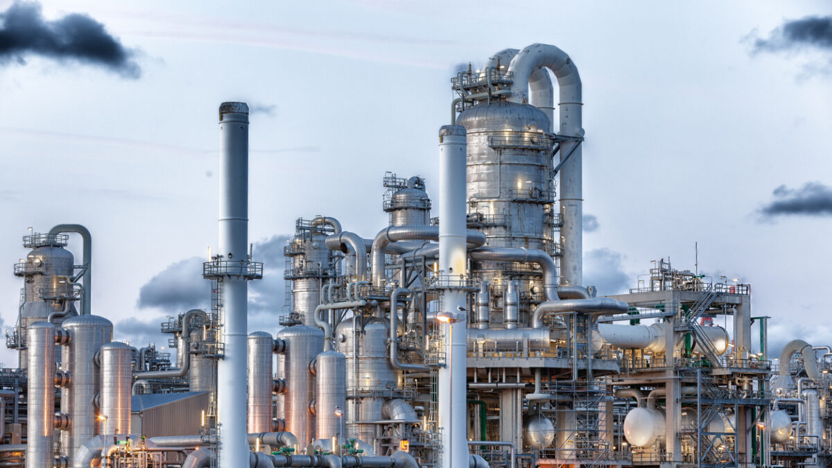 Oil refinery plant, Chemical factory, Oil and Gas Industrial zone, oil pipeline with valves in large oil refinery