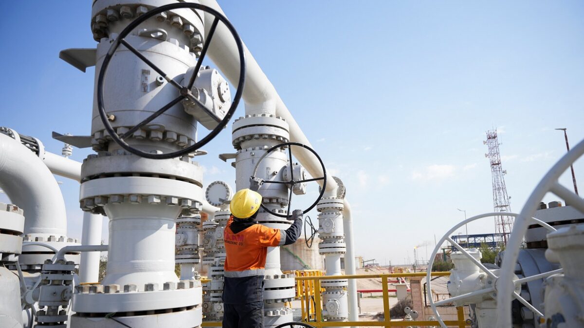 A worker operates valves at the Rumaila oil field, as the country cuts nearly 1.5 million barrels per day of output amid halted exports following the closure of the Strait of Hormuz, in Basra, Iraq, March 4, 2026.