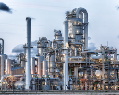 Oil refinery plant, Chemical factory, Oil and Gas Industrial zone, oil pipeline with valves in large oil refinery