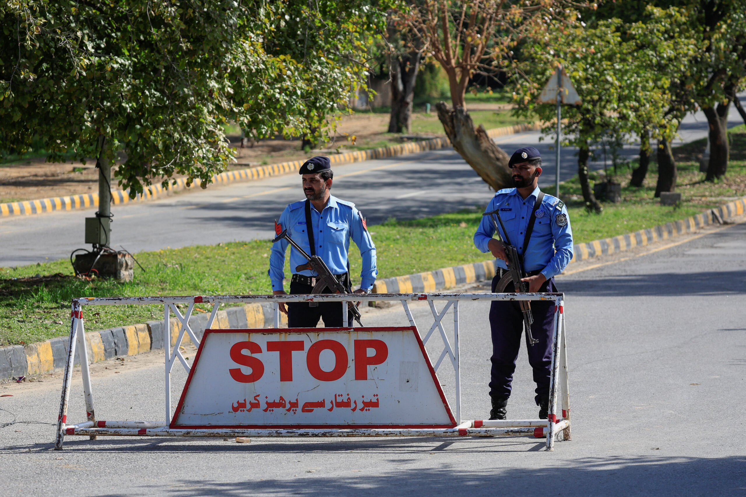 Pakistan prepares to host the U.S. and Iran for peace talks, in Islamabad Police officers stand at a check post on a road leading to the Serena hotel, as Pakistan prepares to host the U.S. and Iran for peace talks, in Islamabad, Pakistan, April 10, 2026. REUTERS/Akhtar Soomro