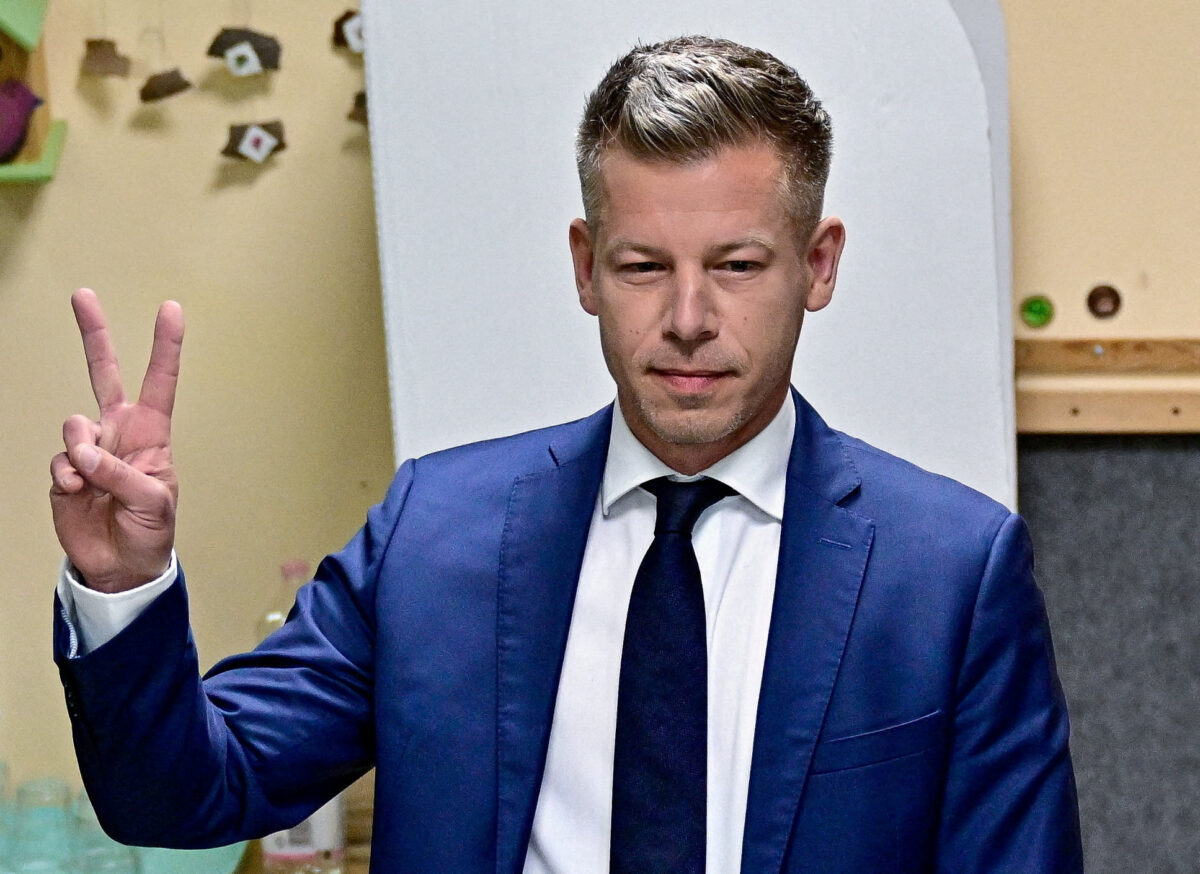 FILE PHOTO: Peter Magyar, leader of the opposition Tisza party, gestures after casting his vote during the Hungarian parliamentary election in Budapest, Hungary, April 12, 2026. REUTERS/Marton Monus/File Photo