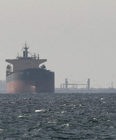 FILE PHOTO: Cargo ships in the Gulf, near the Strait of Hormuz, as seen from northern Ras al-Khaimah, near the border with Oman’s Musandam governance, amid the U.S.-Israeli conflict with Iran, in United Arab Emirates, March 11, 2026. REUTERS/Stringer/File Photo/File Photo