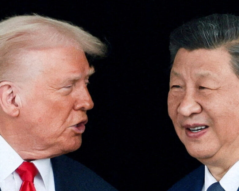 FILE PHOTO: U.S. President Donald Trump and Chinese President Xi Jinping talk as they leave after a bilateral meeting at Gimhae International Airport, on the sidelines of the Asia-Pacific Economic Cooperation (APEC) summit, in Busan, South Korea, October 30, 2025. REUTERS/Evelyn Hockstein/File Photo
