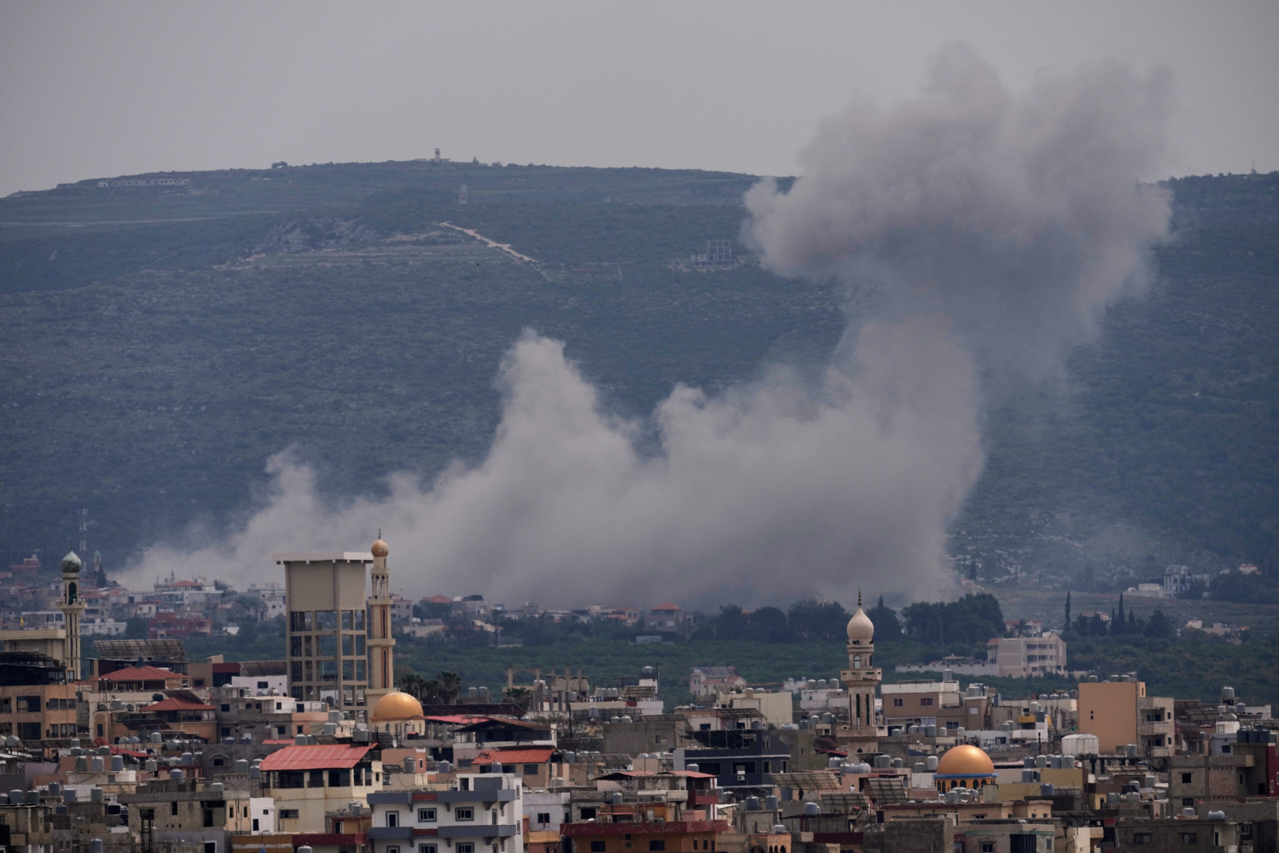 Lebanon Israel Iran War Smoke rises following an Israeli airstrike on the village of Qlaileh, as seen from the southern port city of Tyre, Lebanon, Wednesday, April 15, 2026. (AP Photo/Hussein Malla)