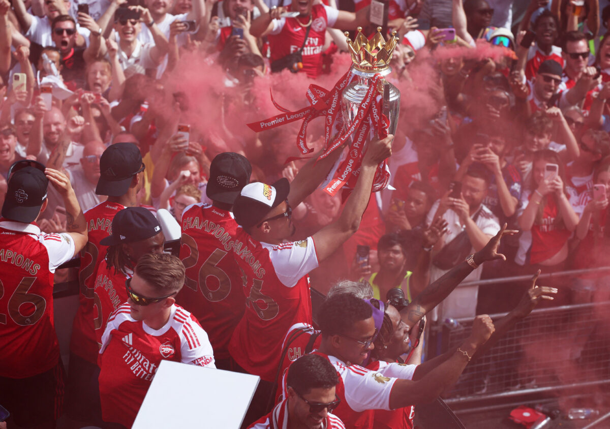 Soccer Football - Premier League - Arsenal Victory Parade - London, Britain - May 31, 2026 Arsenal's William Saliba and teammates celebrate with the Premier League trophy during the victory parade REUTERS
