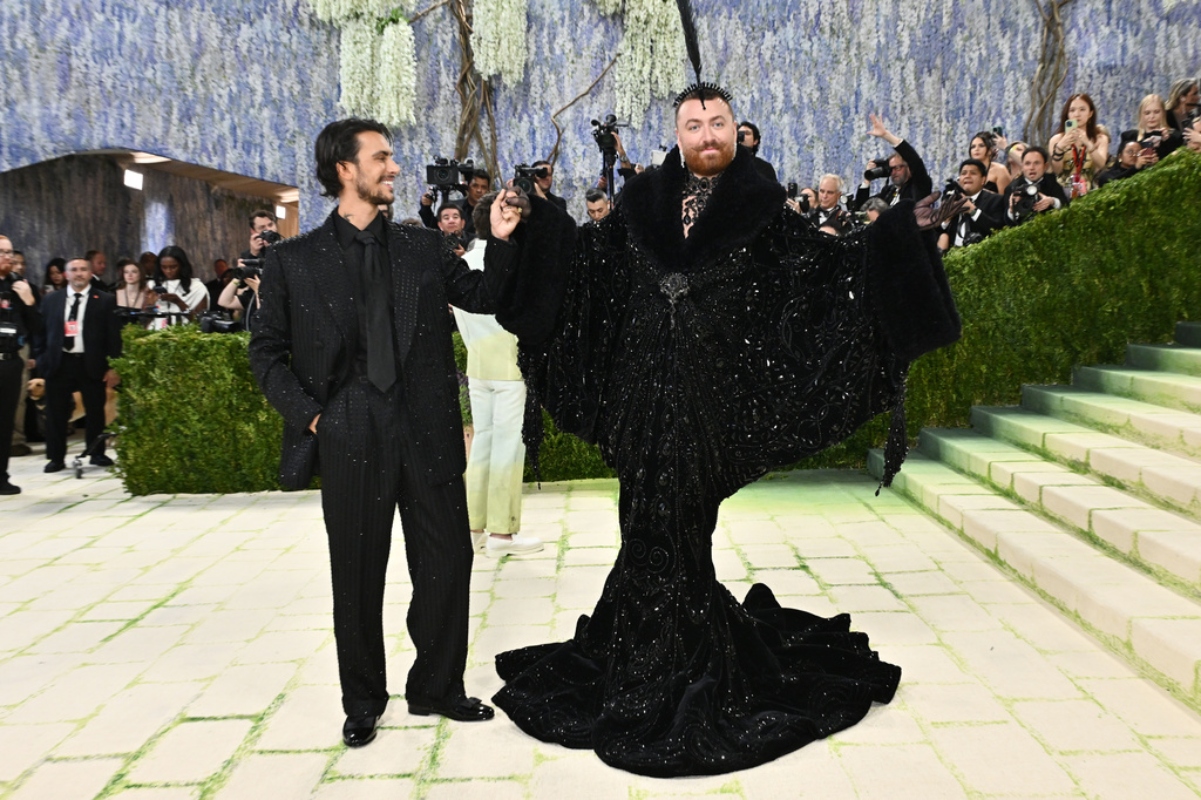 Christian Cowan, left, and Sam Smith arrive at The Metropolitan Museum of Art's Costume Institute benefit gala celebrating the opening of the "Costume Art" exhibition on Monday, May 4, 2026, in New York.