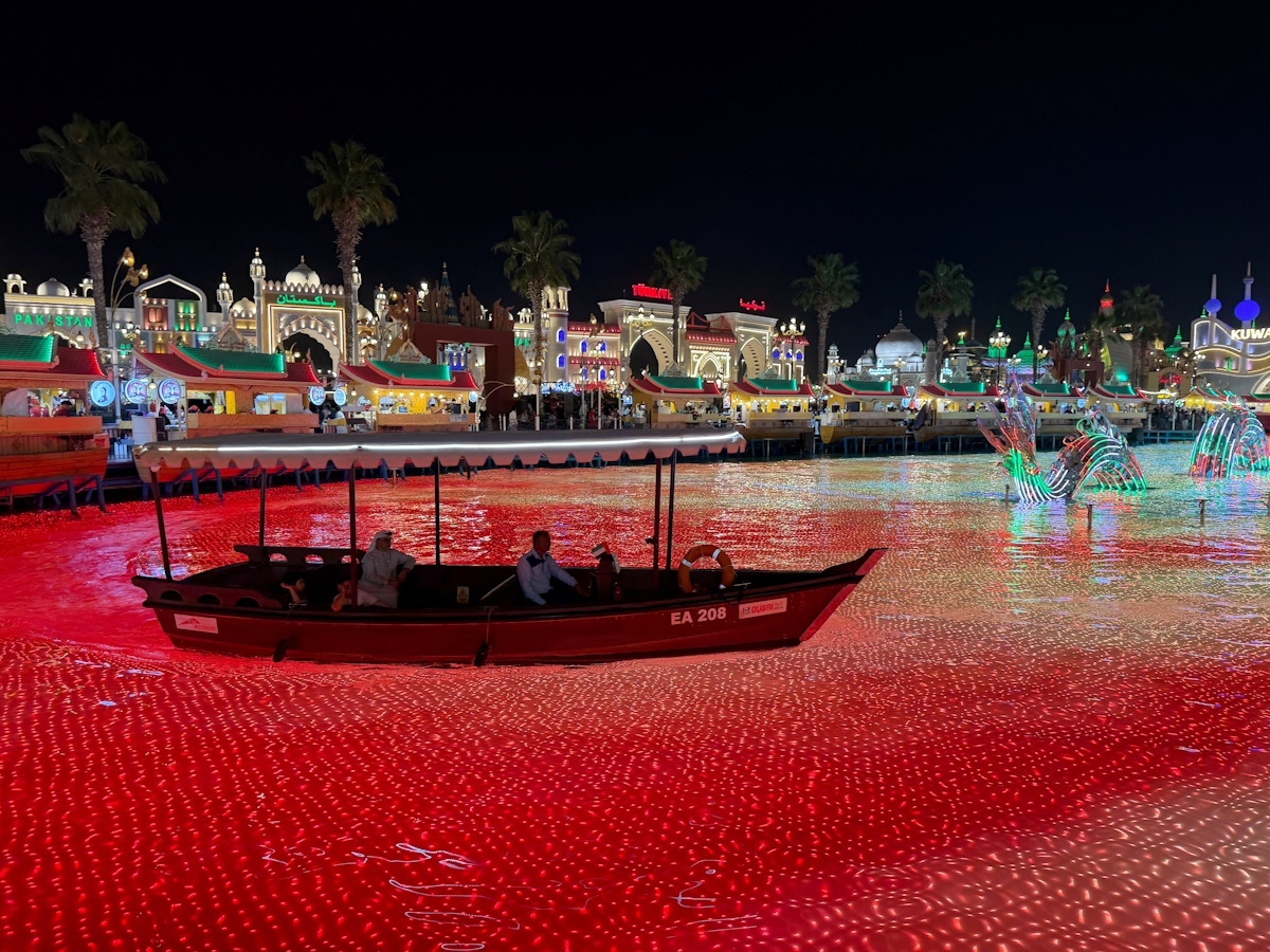 People use a boat as they tour the Global Village in Dubai, United Arab Emirates, May 2, 2026. Picture taken with a phone. REUTERS/Staff