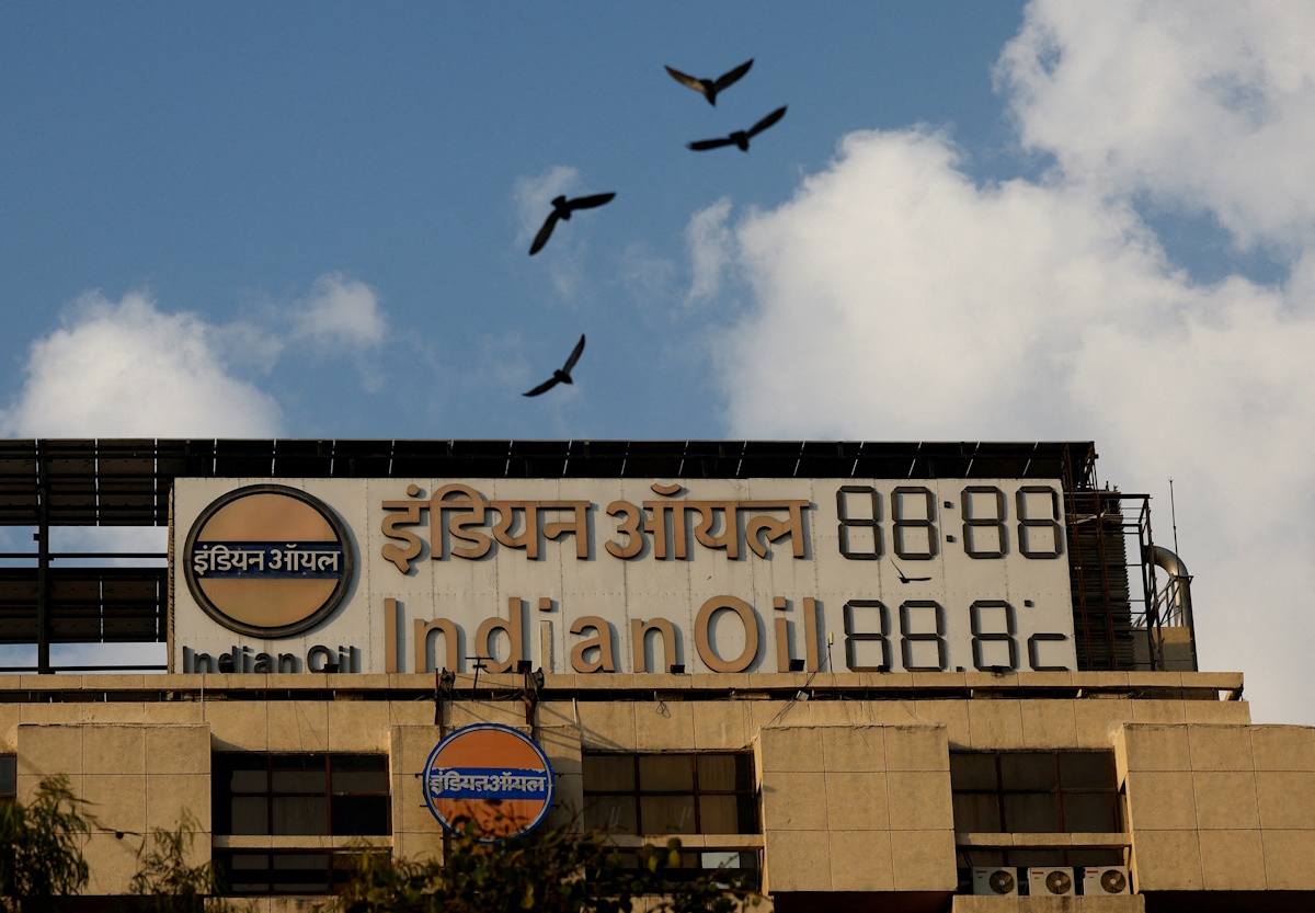 FILE PHOTO: Birds fly over the Indian Oil Corporation Building in New Delhi, India, March 4, 2025