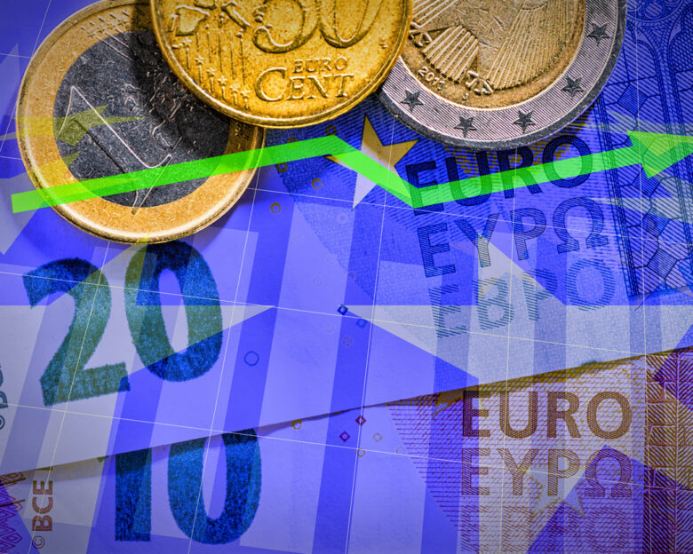Euro notes and coins with diagram
