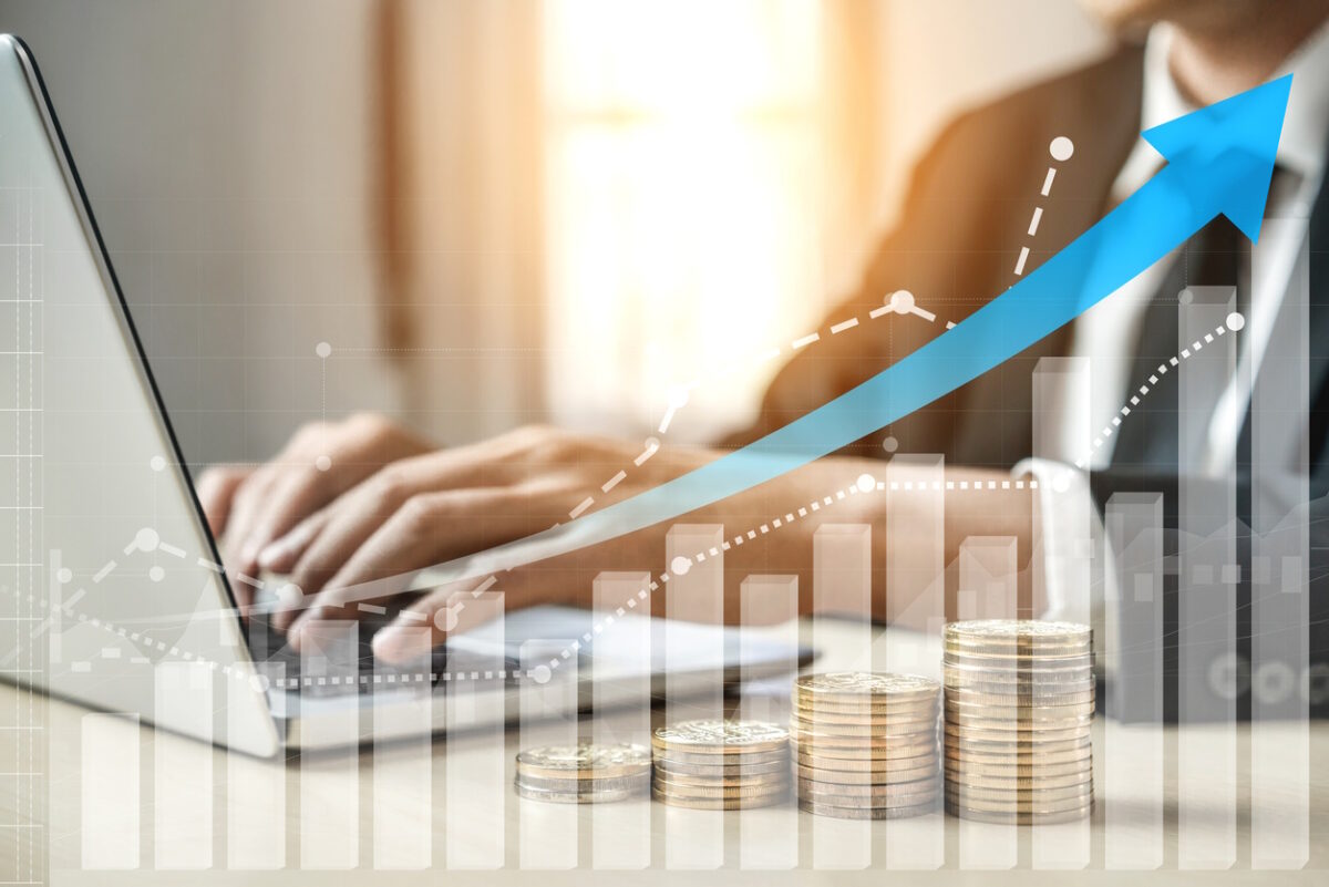 Double Exposure Image of Business and Finance - Businessman with report chart up forward to financial profit growth of stock market investment.