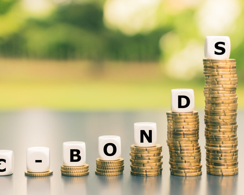 Dice form the expression ""u20ac-Bonds" on increasing high stacks of coins.