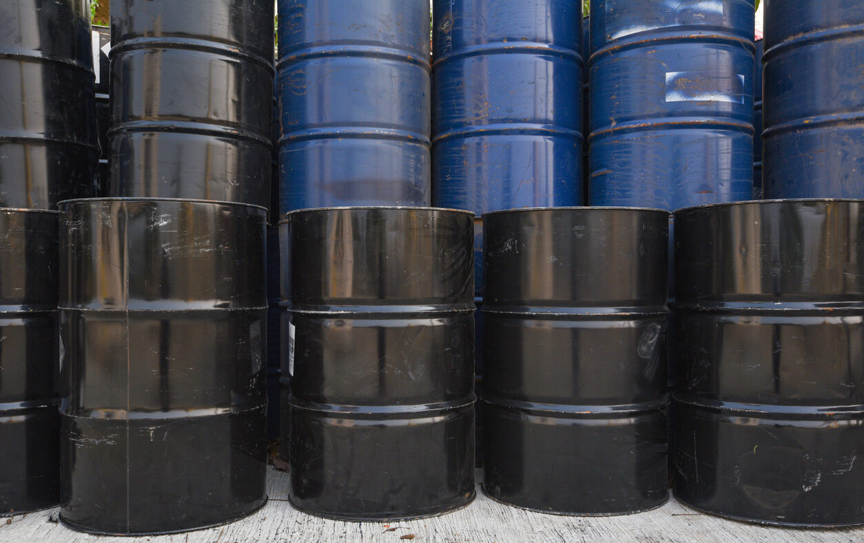 old oil barrels or chemical drums stacked up, industry oil barrel