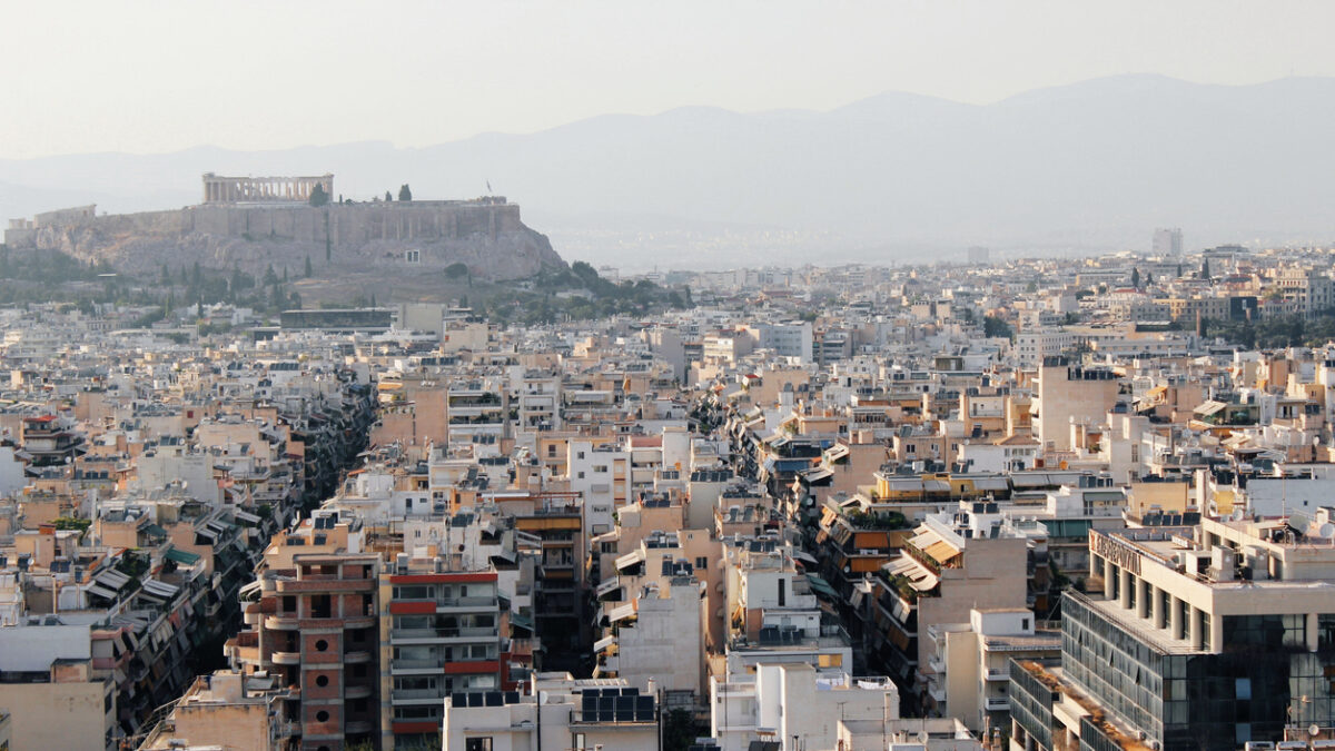 Partial view of Athens city with Acropolis hill in the background - Athens, Greece, June 13 2019.