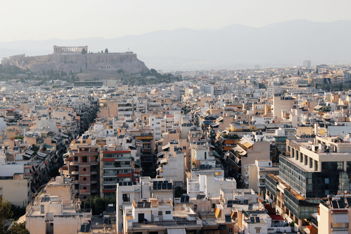 Partial view of Athens city with Acropolis hill in the background - Athens, Greece, June 13 2019.