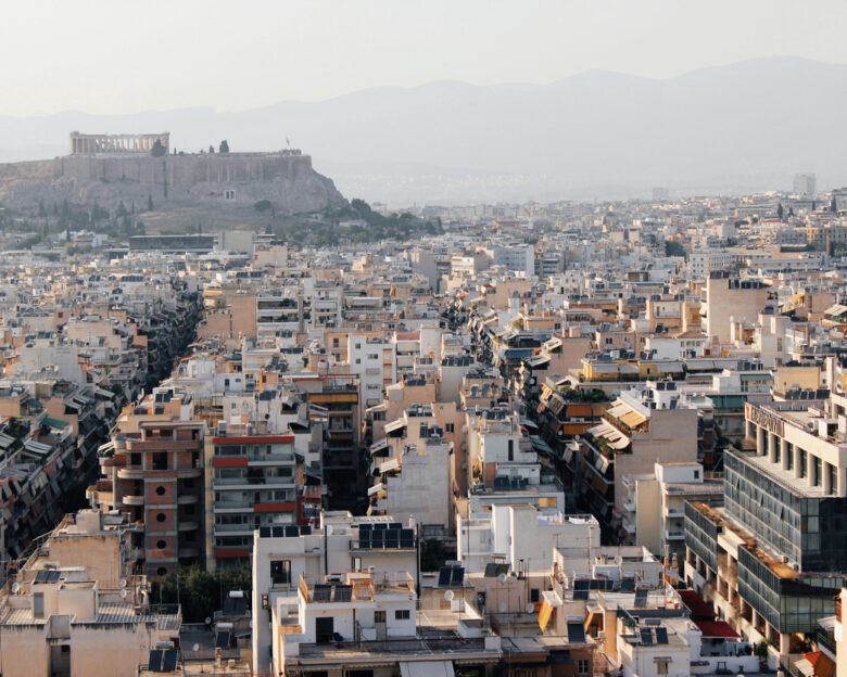 Partial view of Athens city with Acropolis hill in the background - Athens, Greece, June 13 2019.