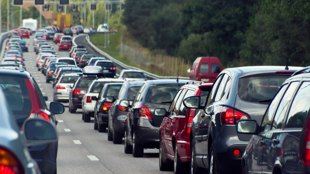 Typical scene during rush hour. A traffic jam with rows of cars. Shallow depth of field.