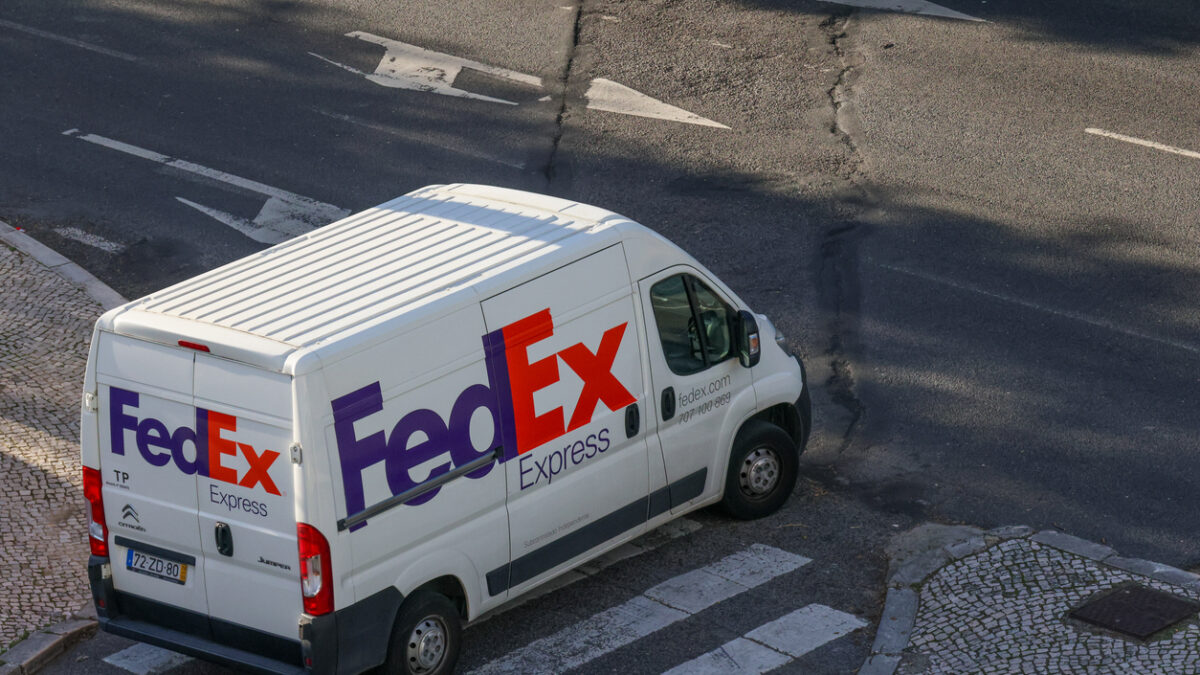 Lisbon, Portugal October 25, 2024, White fedex express delivery van parked on a city street, ready for shipping and logistics operations