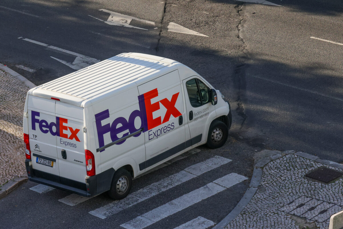 Lisbon, Portugal October 25, 2024, White fedex express delivery van parked on a city street, ready for shipping and logistics operations