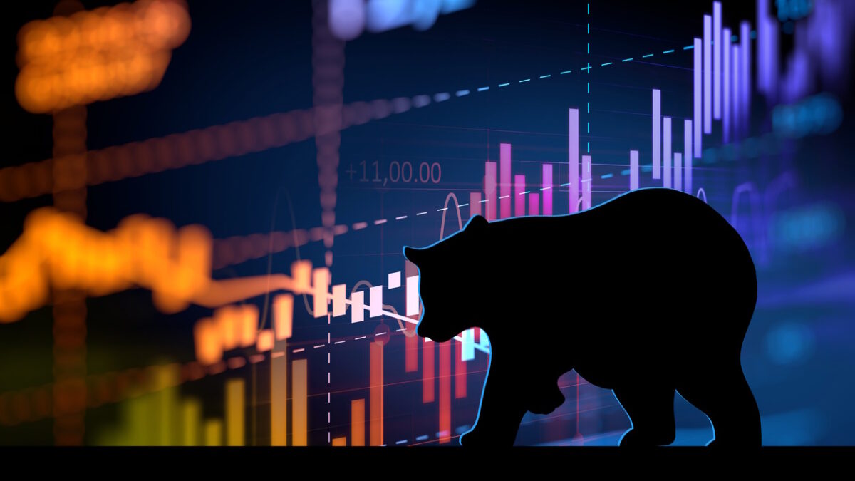 silhouette form of bear on financial stock market graph represent stock market crash or down trend investment