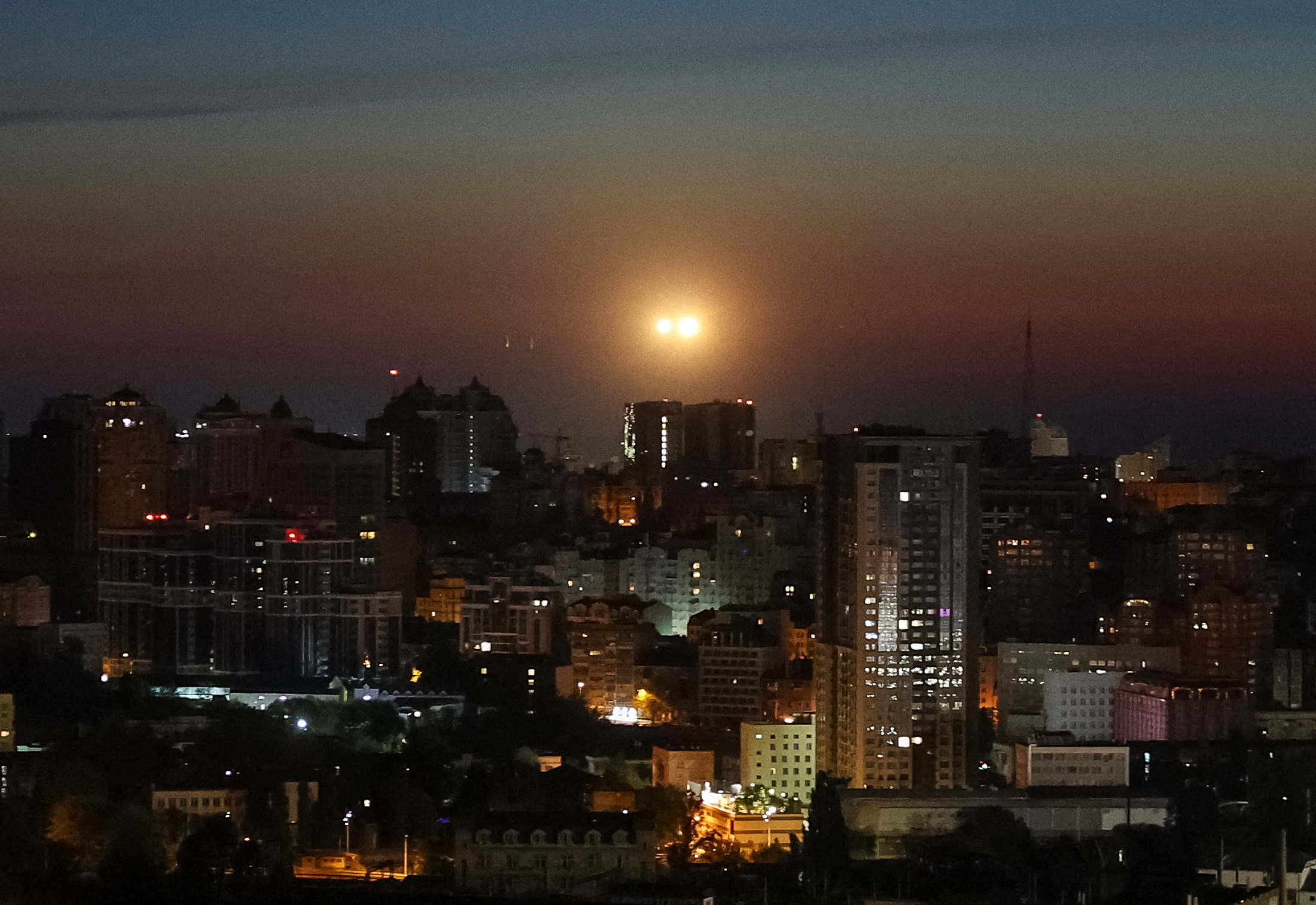Explosions over the city as Ukrainian servicemen hit a Russian drone during a Russian drone strike, amid Russia's attack on Ukraine, in Kyiv, Ukraine May 12, 2026. REUTERS/Gleb Garanich