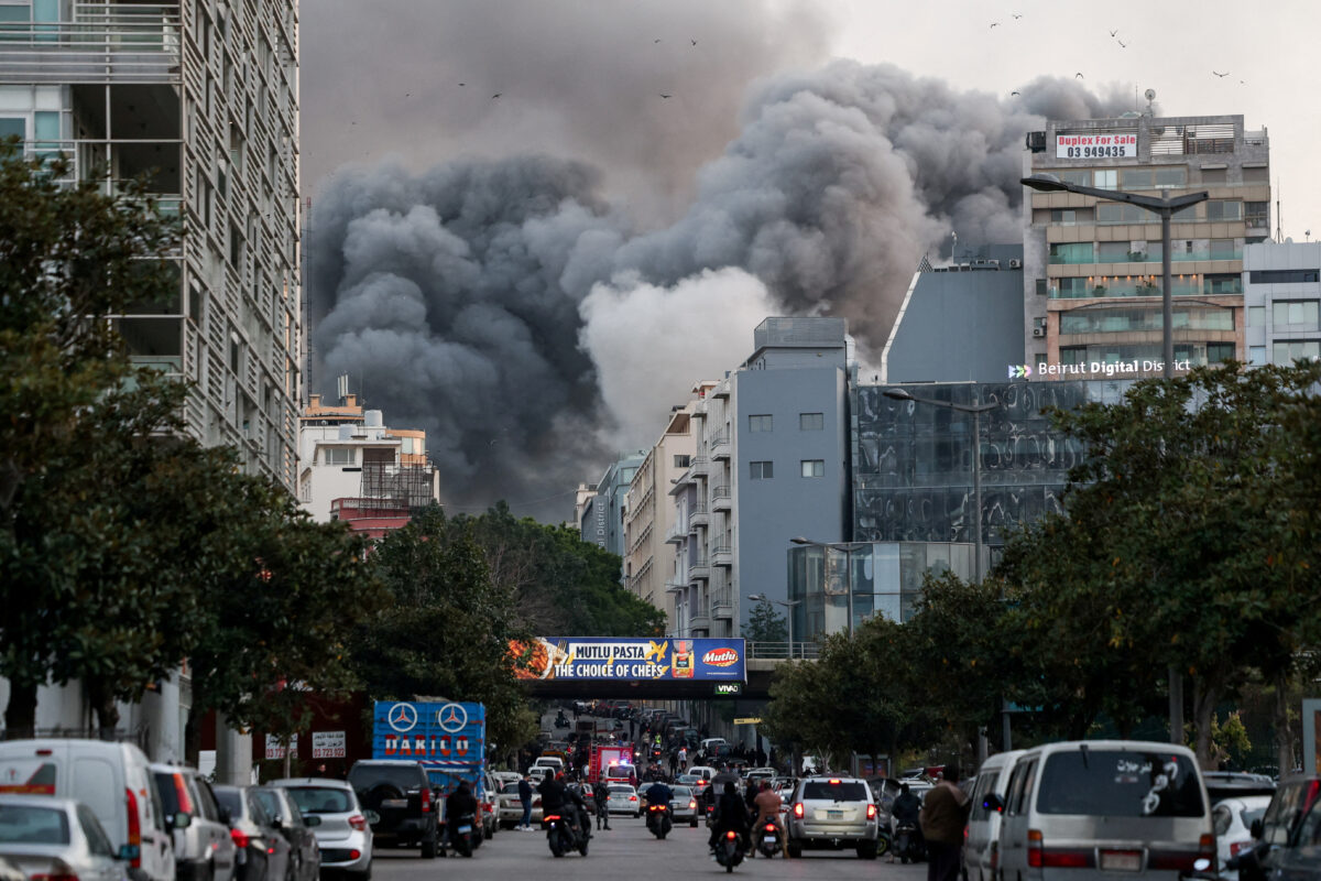 FILE PHOTO: Smoke rises after an Israeli strike in central Beirut's Bachoura neighbourhood, following an escalation between Hezbollah and Israel, amid the U.S.-Israeli conflict with Iran, in Beirut, Lebanon, March 12, 2026. REUTERS/Claudia Greco/File Photo