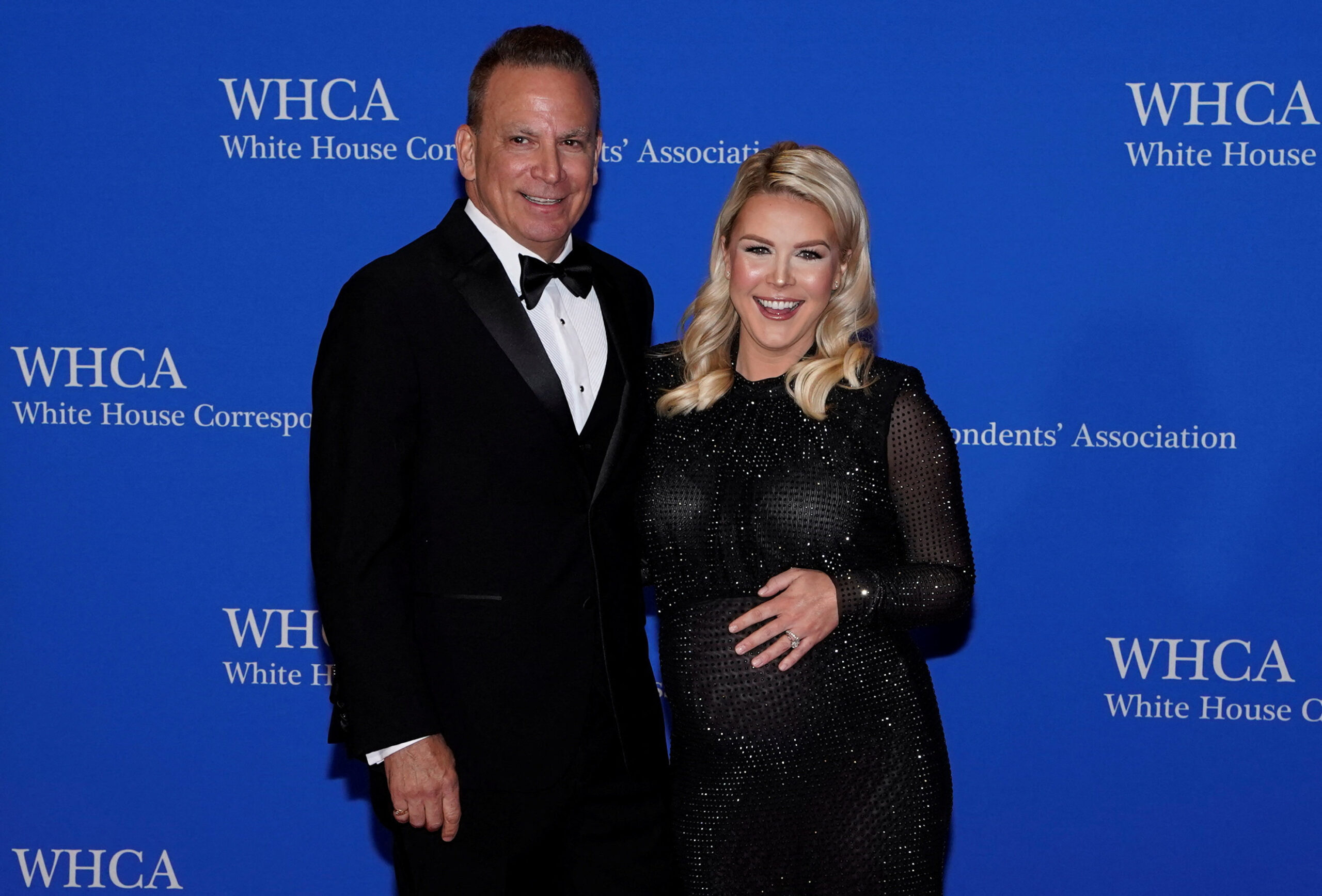 White House Press Secretary Karoline Leavitt and her husband Nicholas Riccio pose on the red carpet for the 2026 White House Correspondents' Association (WHCA) dinner in Washington, D.C., U.S., April 25, 2026.