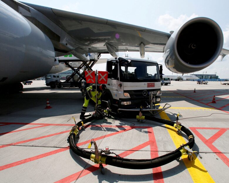 FILE PHOTO: A Lufthansa Airbus 380 is refueled in Frankfurt airport July 12, 2013. REUTERS/Ralph Orlowski/File Photo