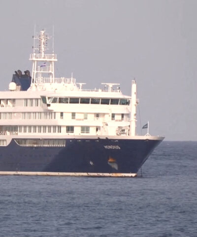 A boat beside cruise ship MV Hondius, hit by Hantavirus, anchored off Cape Verde port, on the day sick passengers were evacuated by boat from the cruise ship, in Praia Port, Cape Verde, in this screengrab obtained from a video, May 5, 2026. REUTERS TV via REUTERS . REFILE – ADDING 'HANTAVIRUS' KEYWORD TO CAPTION