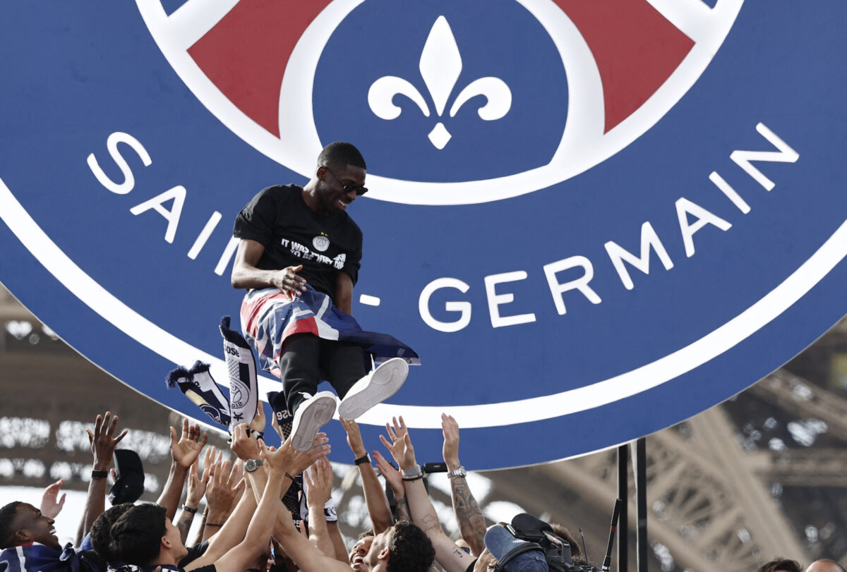 Soccer Football - UEFA Champions League - Paris St Germain celebrate winning the UEFA Champions League Final - Paris, France - May 31, 2026 Paris St Germain players lift Ousmane Dembele in the air they celebrate winning the UEFA Champions League REUTERS