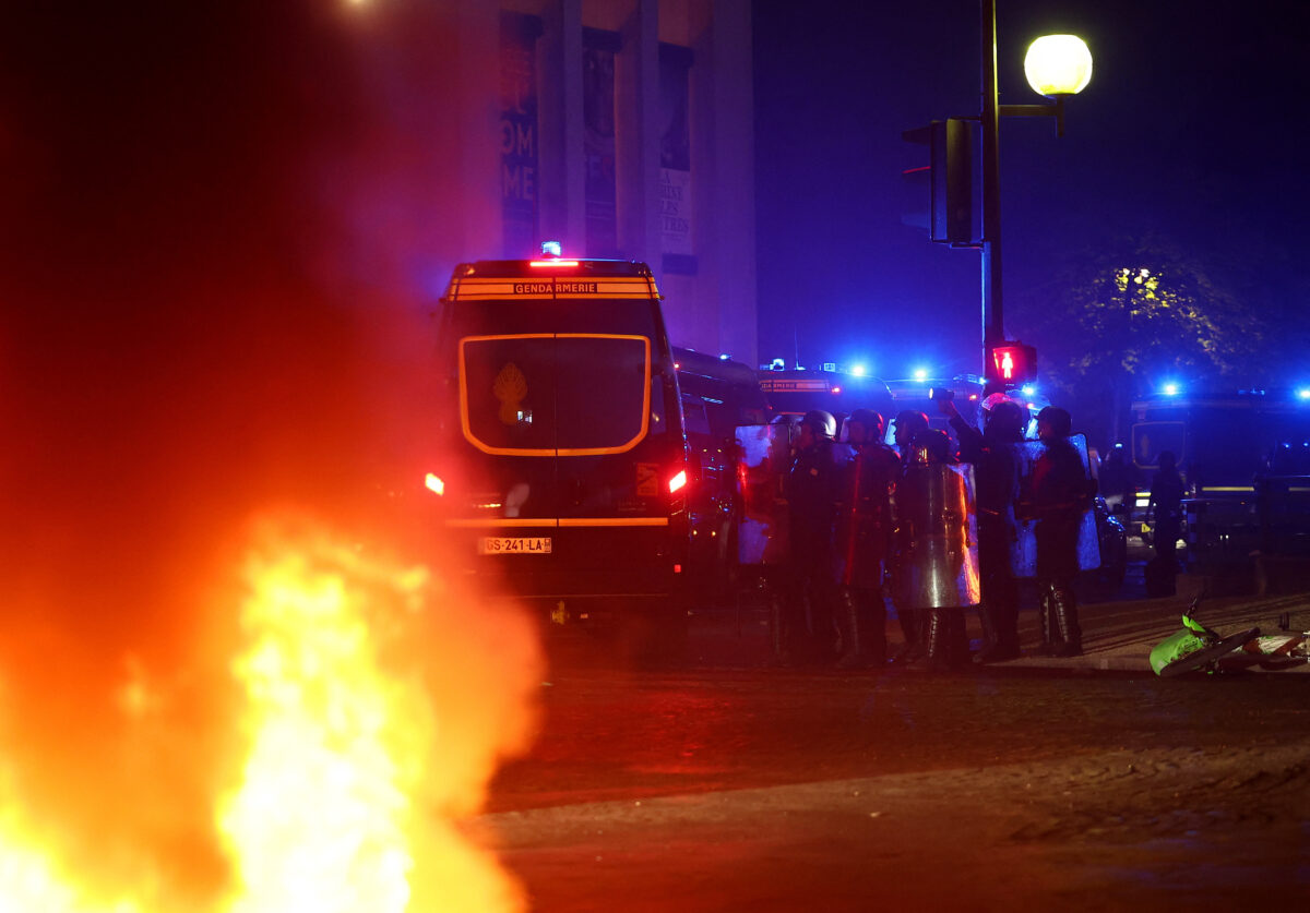 Soccer Football - UEFA Champions League - Paris St Germain fans celebrate winning the UEFA Champions League - Paris, France - May 31, 2026 Police officers in the streets after Paris St Germain won the UEFA Champions League REUTERS
