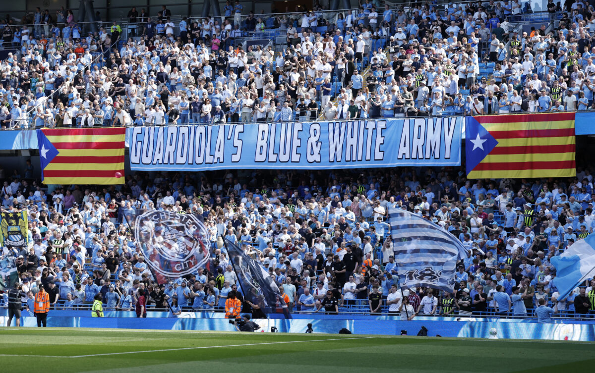 Soccer Football - Premier League - Manchester City v Aston Villa - Etihad Stadium, Manchester, Britain - May 24, 2026 Manchester City fans display a banner for manager Pep Guardiola in the stands before the match Action Images via Reuters