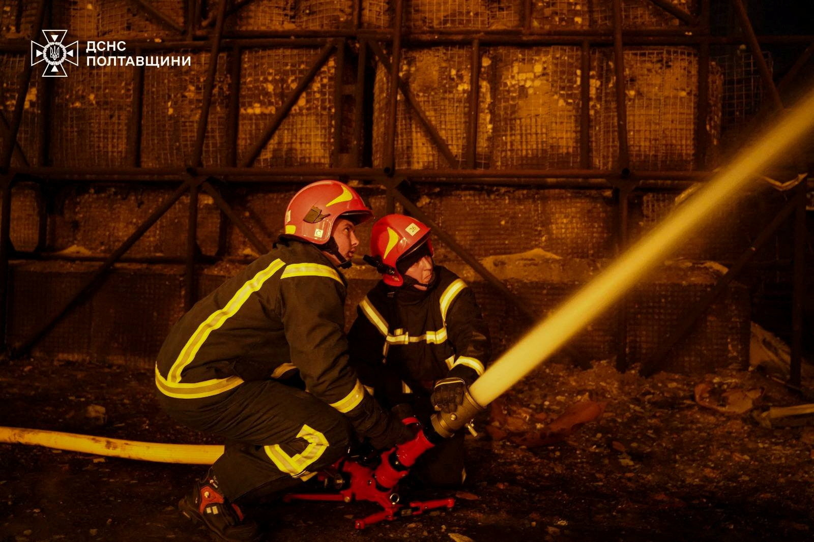 Firefighters work at the site of a natural gas production facility which was hit by Russian drone and missile strikes, amid Russia's attack on Ukraine, in Poltava region, Ukraine May 5, 2026. Press service of the State Emergency Service of Ukraine in Poltava region/Handout via REUTERS ATTENTION EDITORS - THIS IMAGE HAS BEEN SUPPLIED BY A THIRD PARTY.
