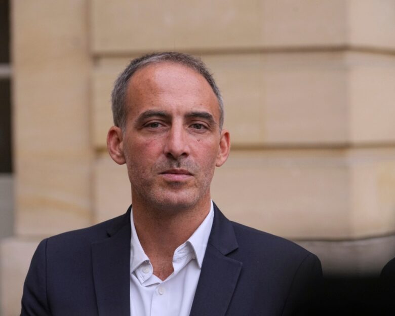 Raphael Glucksmann, co-president of French centre-left party, Place Publique, speaks to medias following a meeting with French Prime Minister Francois Bayrou before a confidence vote, at the Hotel Matignon in Paris Tuesday, Sept. 2, 2025.
