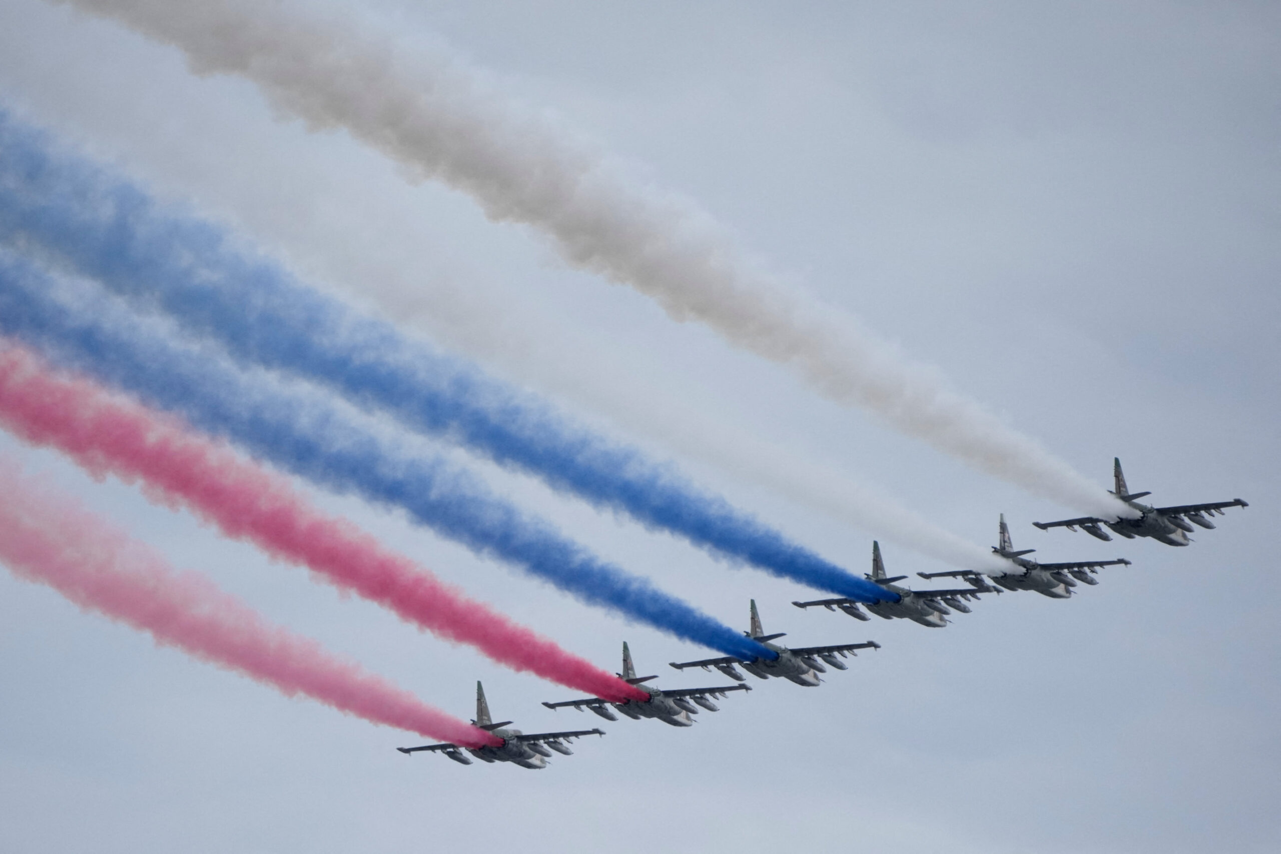 Russian Air Force Su-25 jets fly over Red Square, leaving trails of smoke in the colours of the Russian state flag, during the Victory Day military parade in Moscow, Saturday, May 9, 2026, during celebrations of the 81st anniversary of the Soviet Union's victory over Nazi Germany during World War II. Pavel Bednyakov