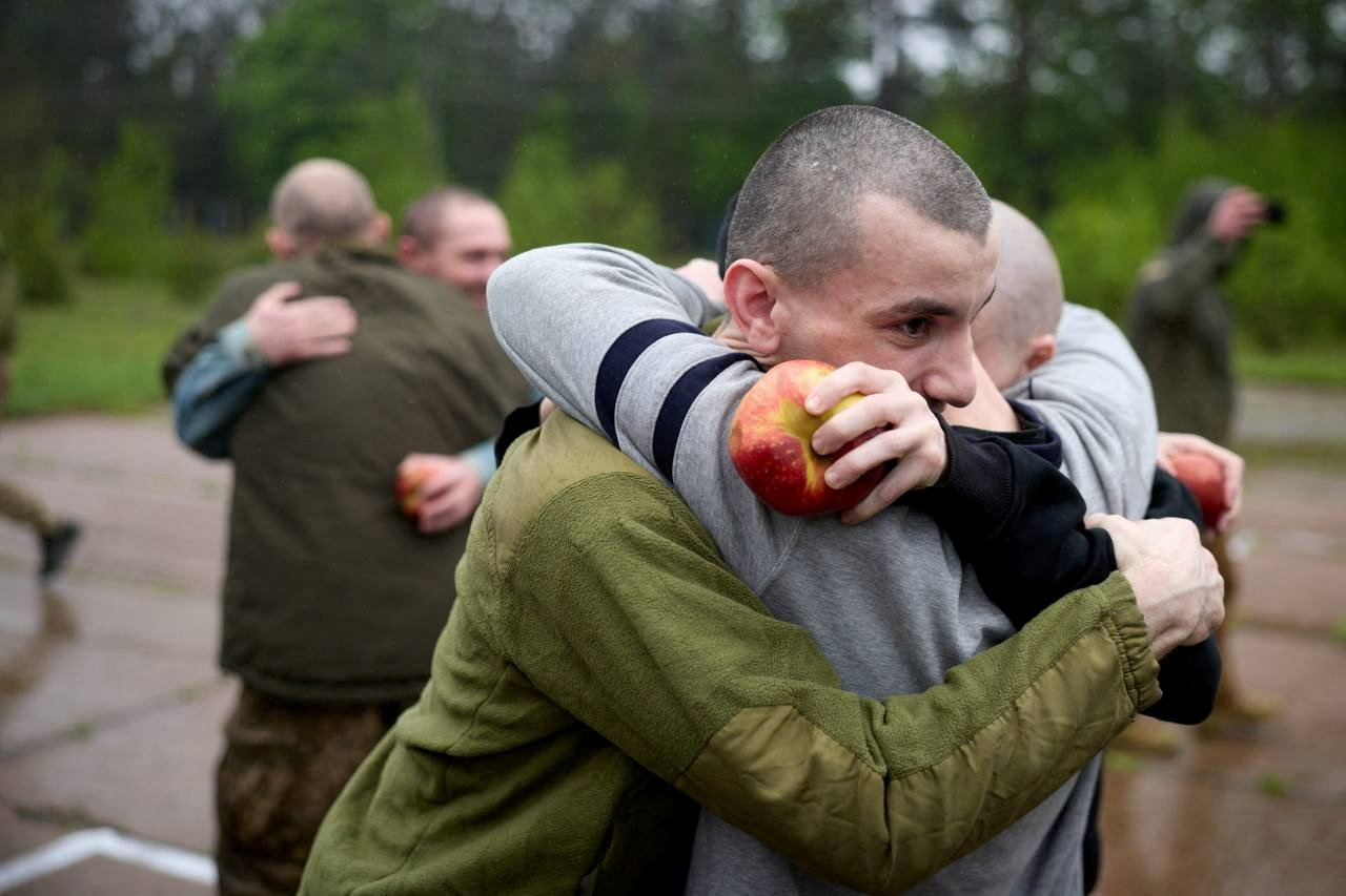 Ukrainian prisoners of war (POWs) after a swap, amid Russia's attack on Ukraine, at an unknown location in Ukraine, in this handout picture released May 15, 2026. Ukraine's President Volodymyr Zelenskiy via Telegram