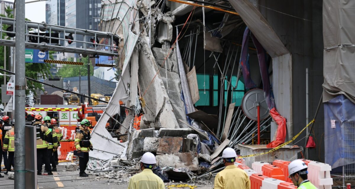 South Korean rescue team inspect the scene where an overpass collapsed while it was being dismantled in Seoul, South Korea, Tuesday, May 26, 2026. (Kim In-chul/Yonhap via AP)