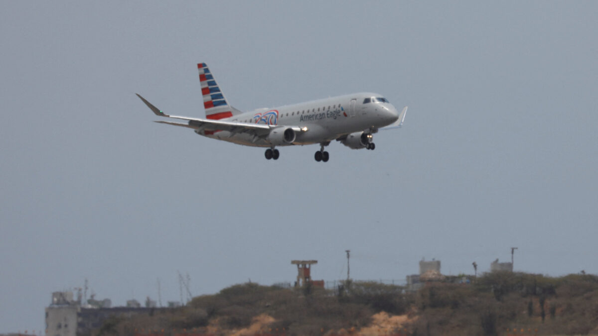 An American Airlines flight from Miami lands at Simon Bolivar International Airport