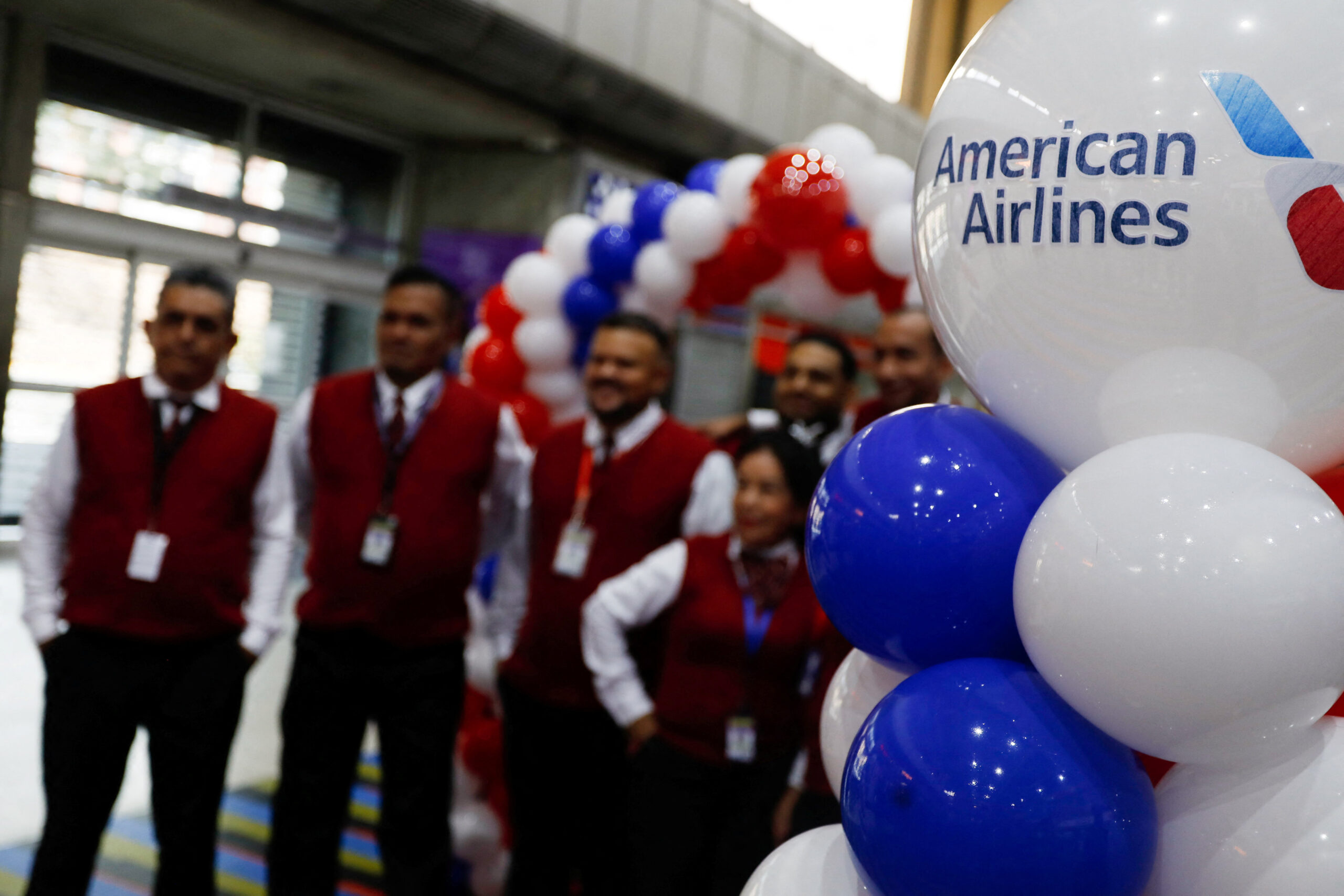 An American Airlines flight from Miami lands at Simon Bolivar International Airport