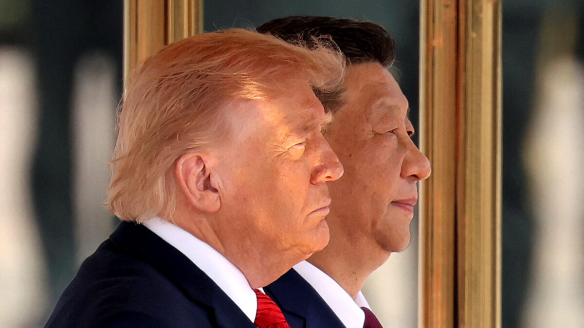 Chinese President Xi Jinping and U.S. President Donald Trump attend a welcome ceremony at the Great Hall of the People in Beijing, China May 14, 2026. REUTERS/Maxim Shemetov/Pool