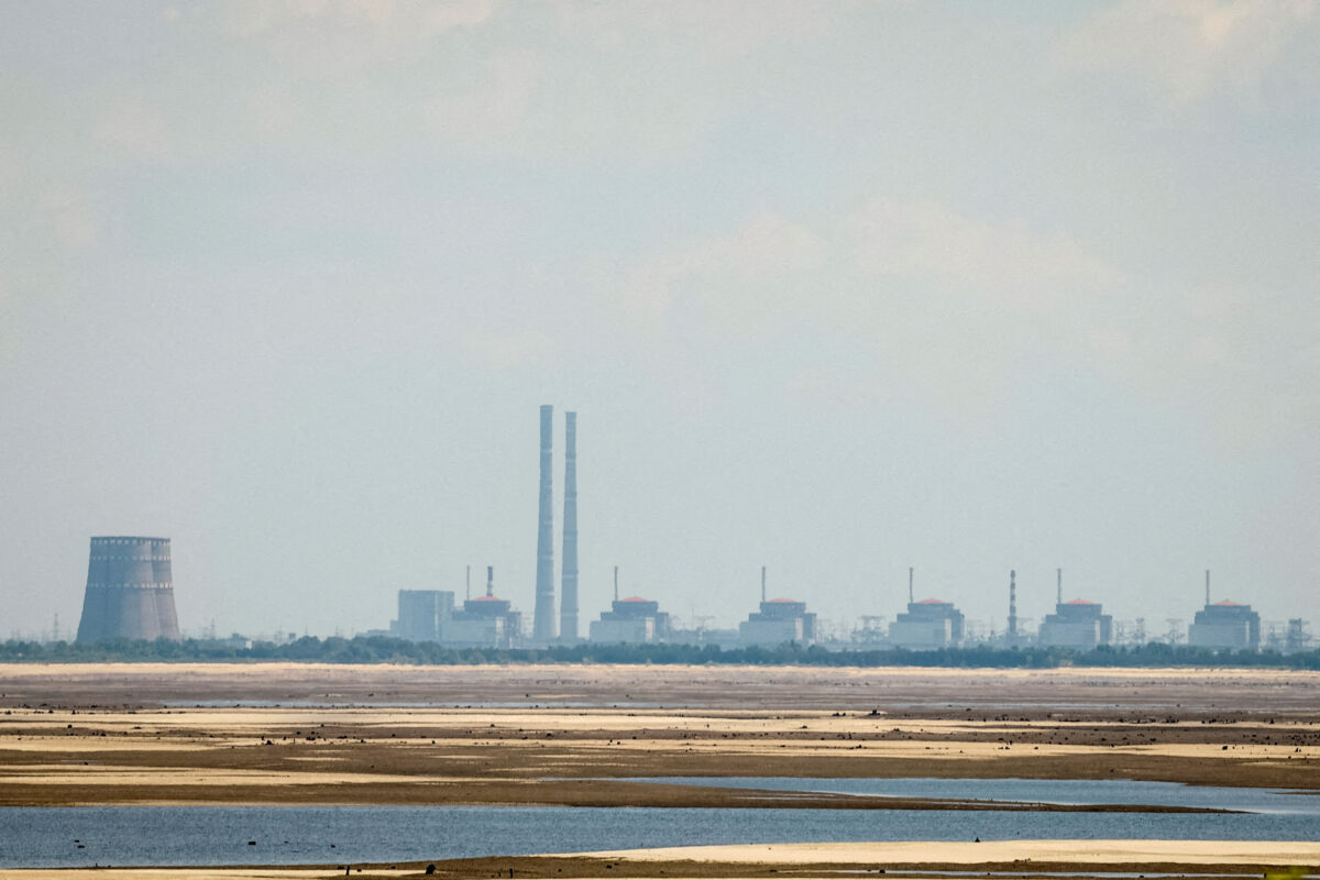 FILE PHOTO: A view shows Zaporizhzhia Nuclear Power Plant from the bank of Kakhovka Reservoir near the town of Nikopol after the Nova Kakhovka dam breached, amid Russia's attack on Ukraine, in Dnipropetrovsk region, Ukraine June 16, 2023. REUTERS/Alina Smutko/File Photo