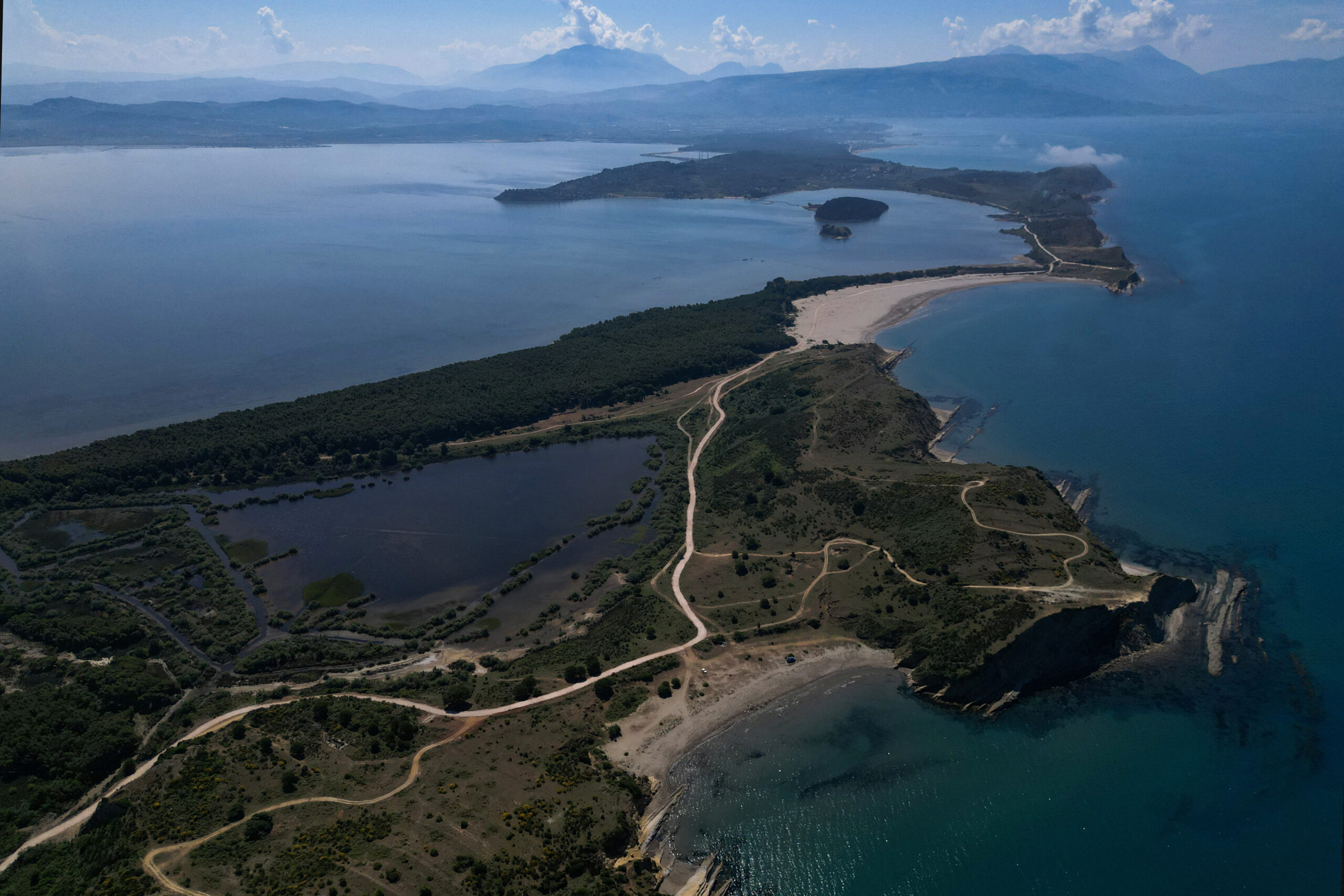 A drone view of a bay at the Vjosa-Narta Protected Area, where a luxury resort is planned by a company linked to Donald Trump's son-in-law, Jared Kushner, in Zvernec near Vlora, Albania, June 10, 2026. REUTERS/Florion Goga