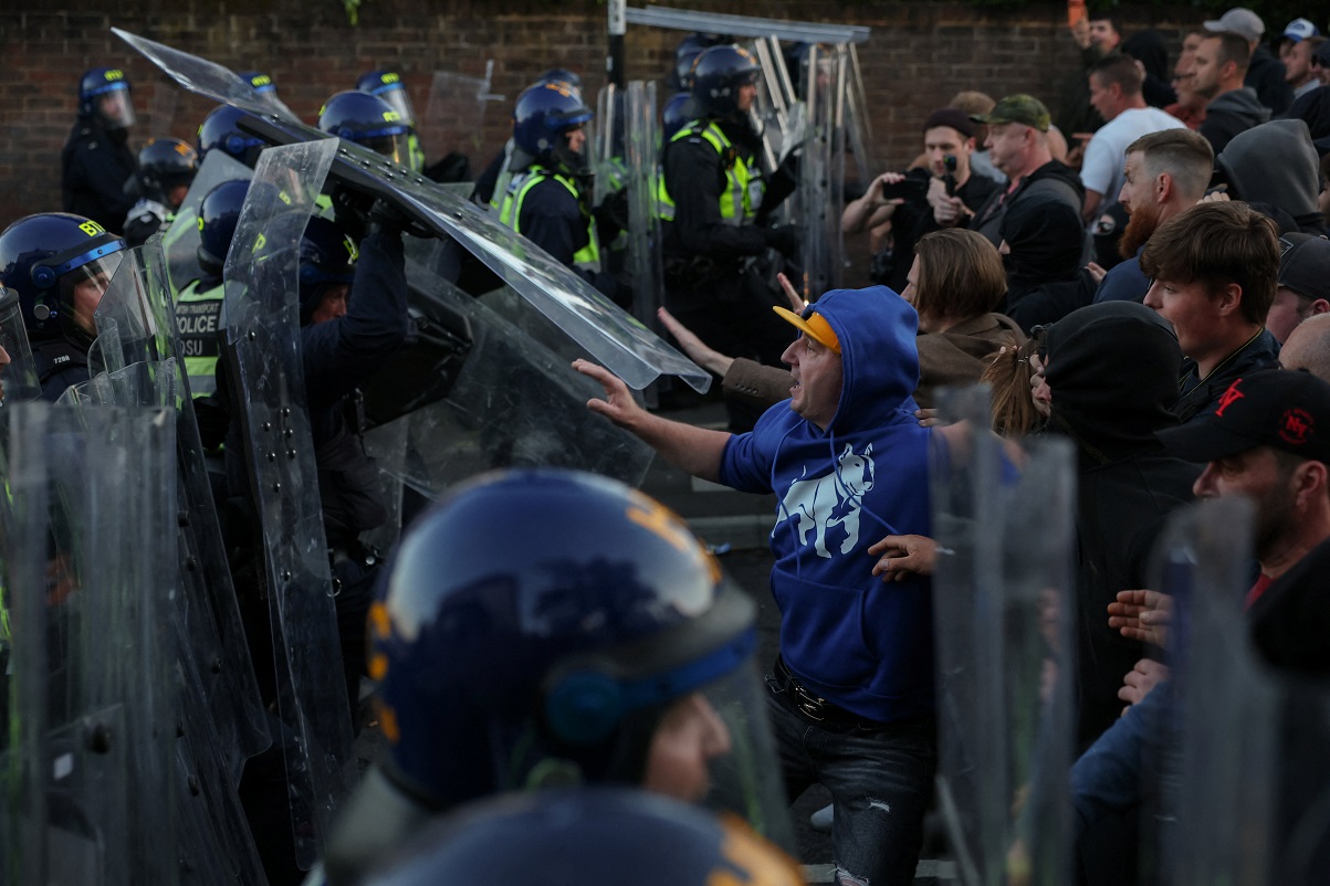 Protesters clash with police officers during a demonstration following the conviction of Vikrum Digwa for the murder of student Henry Nowak, in Southampton, Britain, June 2, 2026. REUTERS