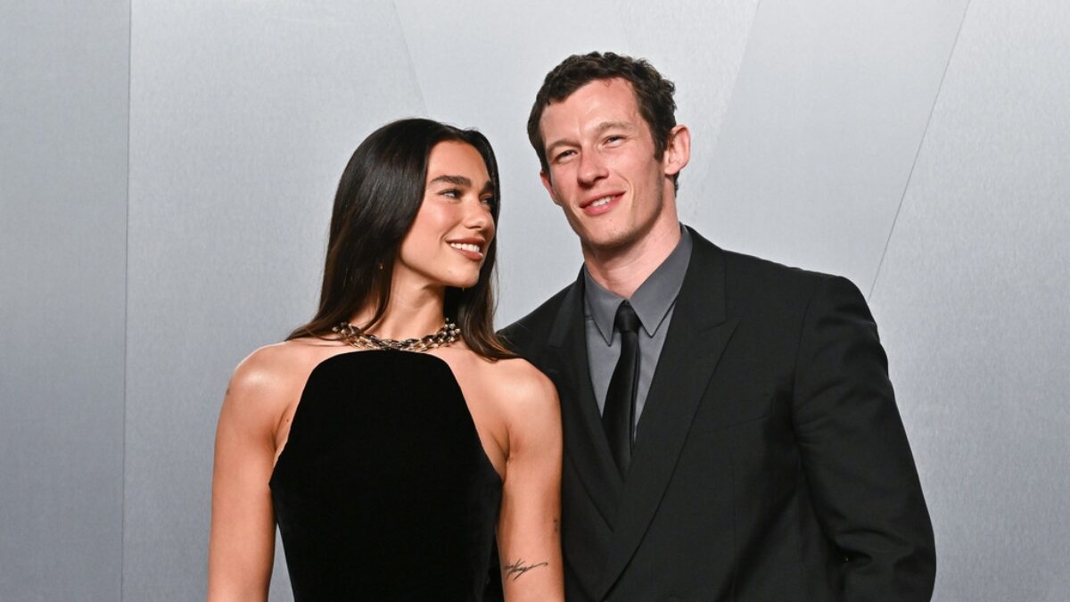 FILE - Dua Lipa, left, and Callum Turner arrive at the Vanity Fair Oscar Party on Sunday, March 15, 2026, at the Los Angeles County Museum of Art in Los Angeles.