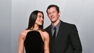 FILE - Dua Lipa, left, and Callum Turner arrive at the Vanity Fair Oscar Party on Sunday, March 15, 2026, at the Los Angeles County Museum of Art in Los Angeles.