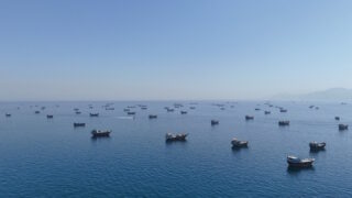 FILE PHOTO: A drone view of vessels anchored in the Strait of Hormuz as seen from Musandam, Oman, June 8, 2026. REUTERS/Stringer/File Photo