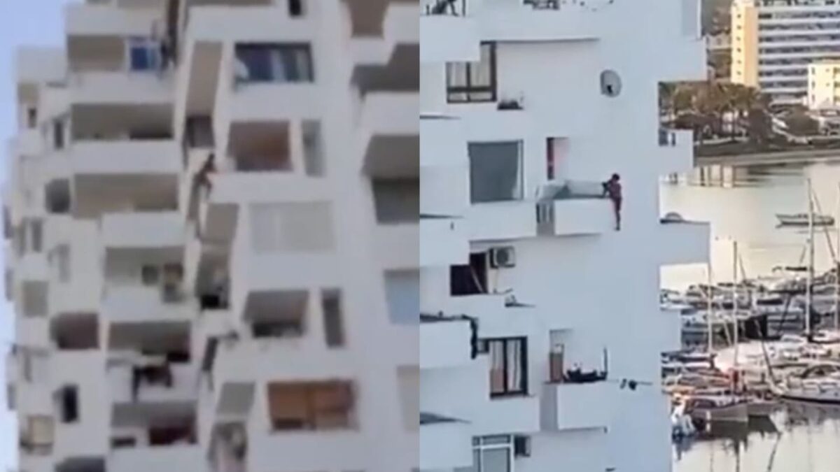 Άνδρας κρέμεται από μπαλκόνι