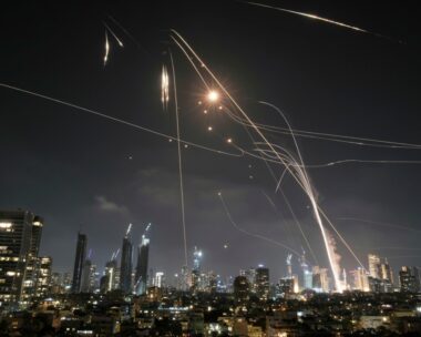Israeli Iron Dome air defense system fires to intercept missiles over Tel Aviv, Israel, Friday, June 13, 2025. (AP Photo/Leo Correa)