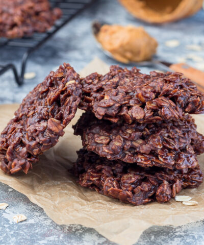Flourless no bake peanut butter and oatmeal chocolate cookies on a parchment, horizontal