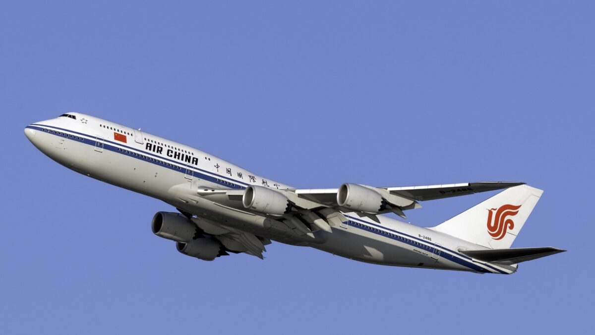 United States of America, New York: Air China Boeing 747-89L Registration B-2486, departing out of New York City's JFK International Airport on a day with clear blue skies