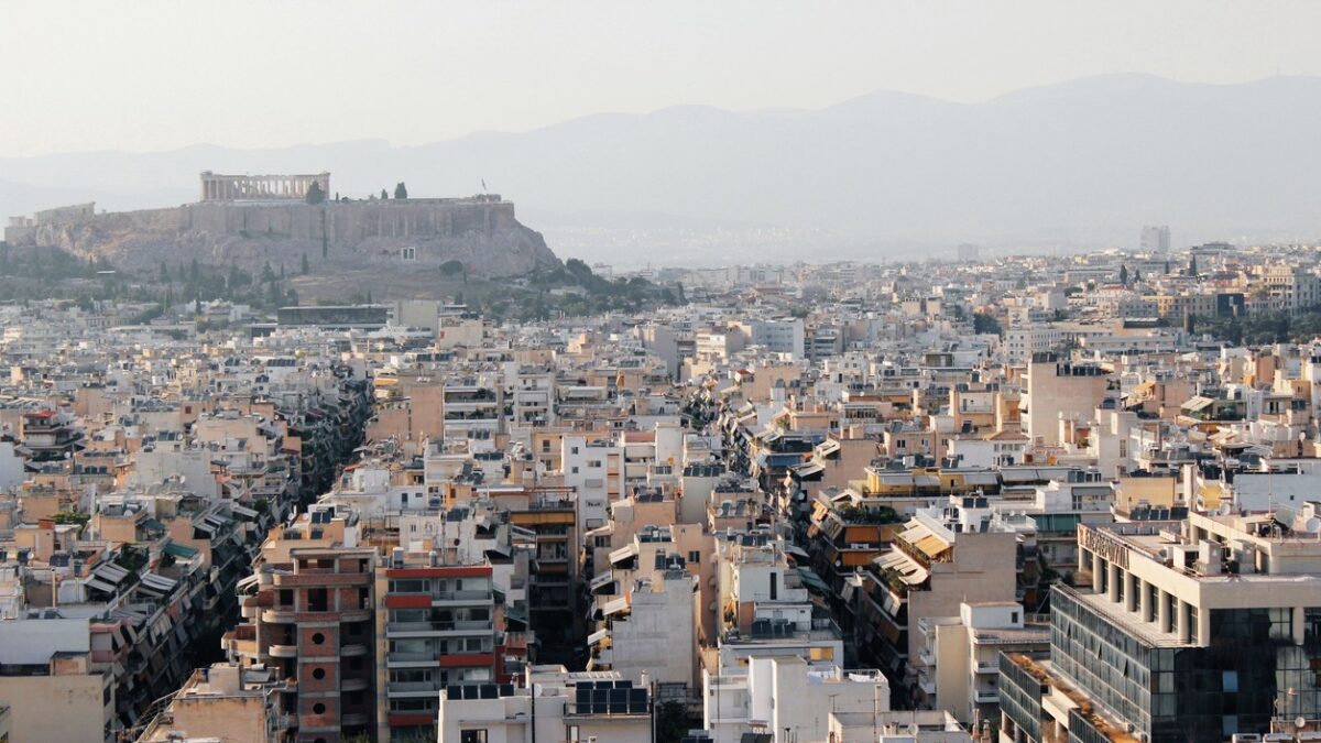 Partial view of Athens city with Acropolis hill in the background - Athens, Greece.